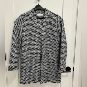 Calvin Klein suit. Blazer size 12. Skirt size 10.